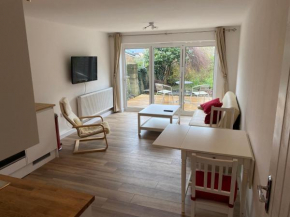 Adorable One-Bedroom Flat With Patio Garden.